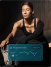 Woman sitting with a Hume digital interface overlay showing 'Metabolic Momentum' data